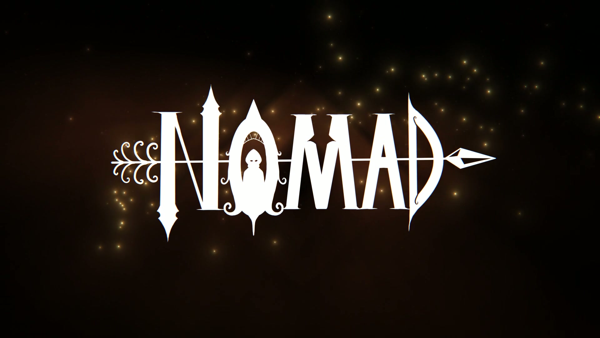 NOMAD logotype on black with gold particles